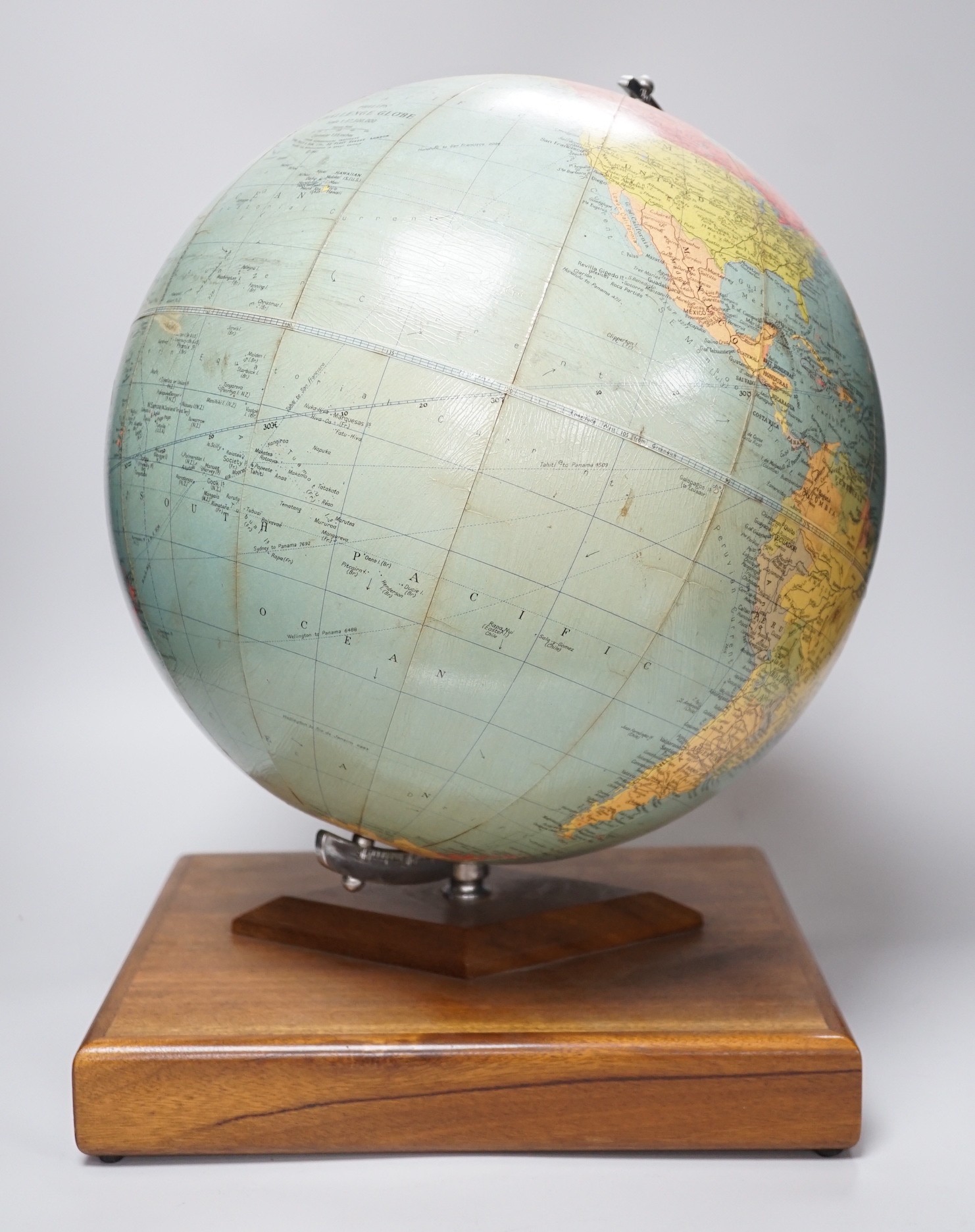 A Philips Challenge Globe, on stand, 46cm high, with atlas